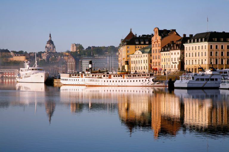 Image of Stockholm, ferries and historical buildings