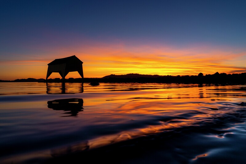 Boat house in sunset. Photo: Brian Tallman/Region Stavanger